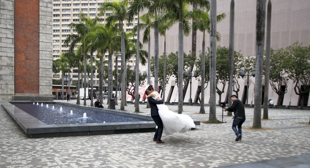 CHINA, HONG KONG - JANUARY 14,2016:Wedding couple on the famous alley in Kowloon, Hong Kong. Romantic moment for the couple