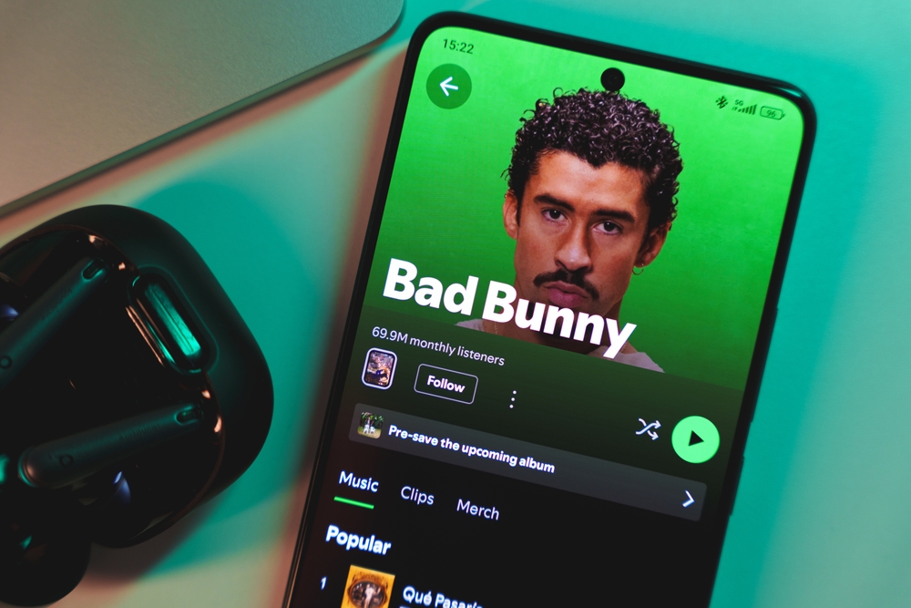A smartphone displaying Bad Bunny's artist profile on Spotify. January 5, 2025