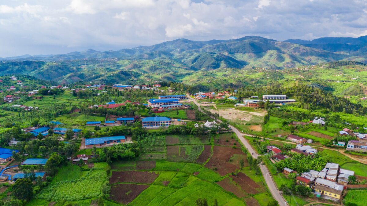 A high-quality aerial drone photography captured by Sky Edition Visual Arts, showcasing the natural beauty of Rwanda Africa, known as the land of a thousand hills.