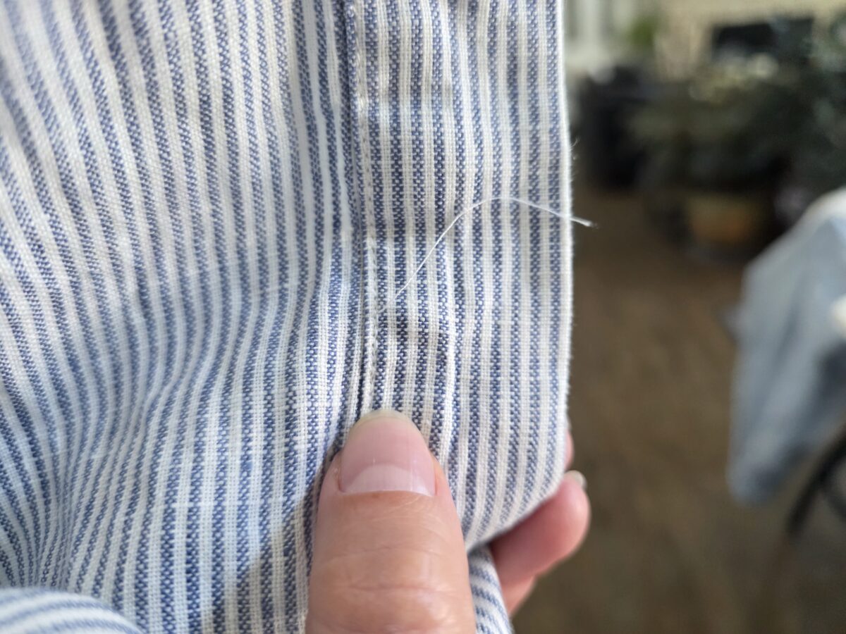 loose threads on camp shirt