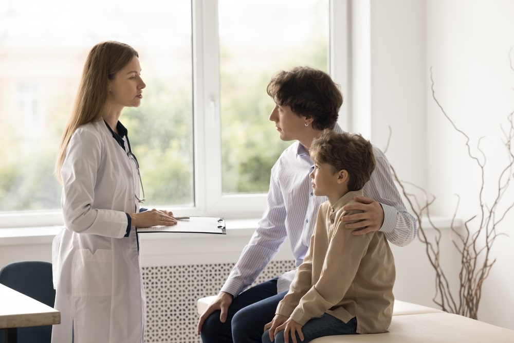 Medical,Checkup.,Attentive,Young,Father,Sit,On,Couch,At,Examination