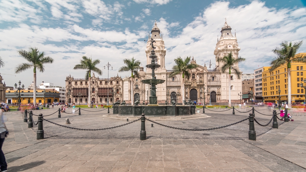 Fountain on The Plaza de Armas timelapse hyperlapse, also known as the Plaza Mayor, sits at the heart of Lima's historic center. Cathedral on a background