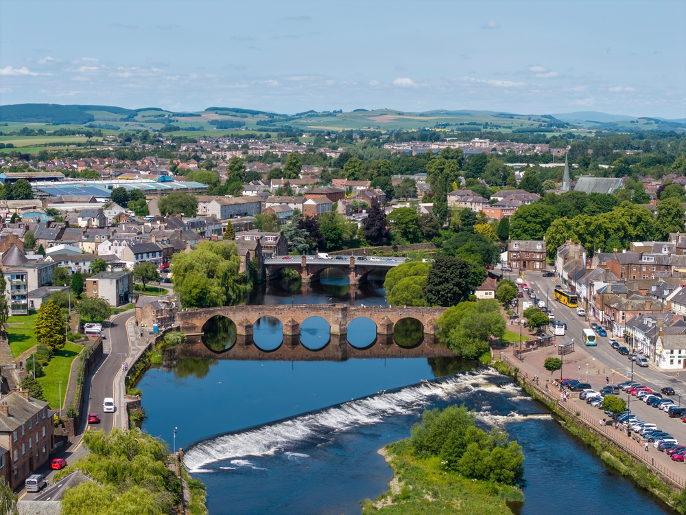 DUMFRIES, DUMFRIES AND GALLOWAY, SCOTLAND - JUNE 18, 2025: Aerial view, River Nith, Dumfries, with multiple bridges spanning the river
